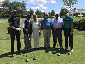 Golf Outing Co-Chair and NCC Board Member Dr. A. Zachary Yamba, second from left, with his foursome and NCC Outreach Coordinator and Board Member Madge Wilson and NCC CEO Richard Rohrman, center.