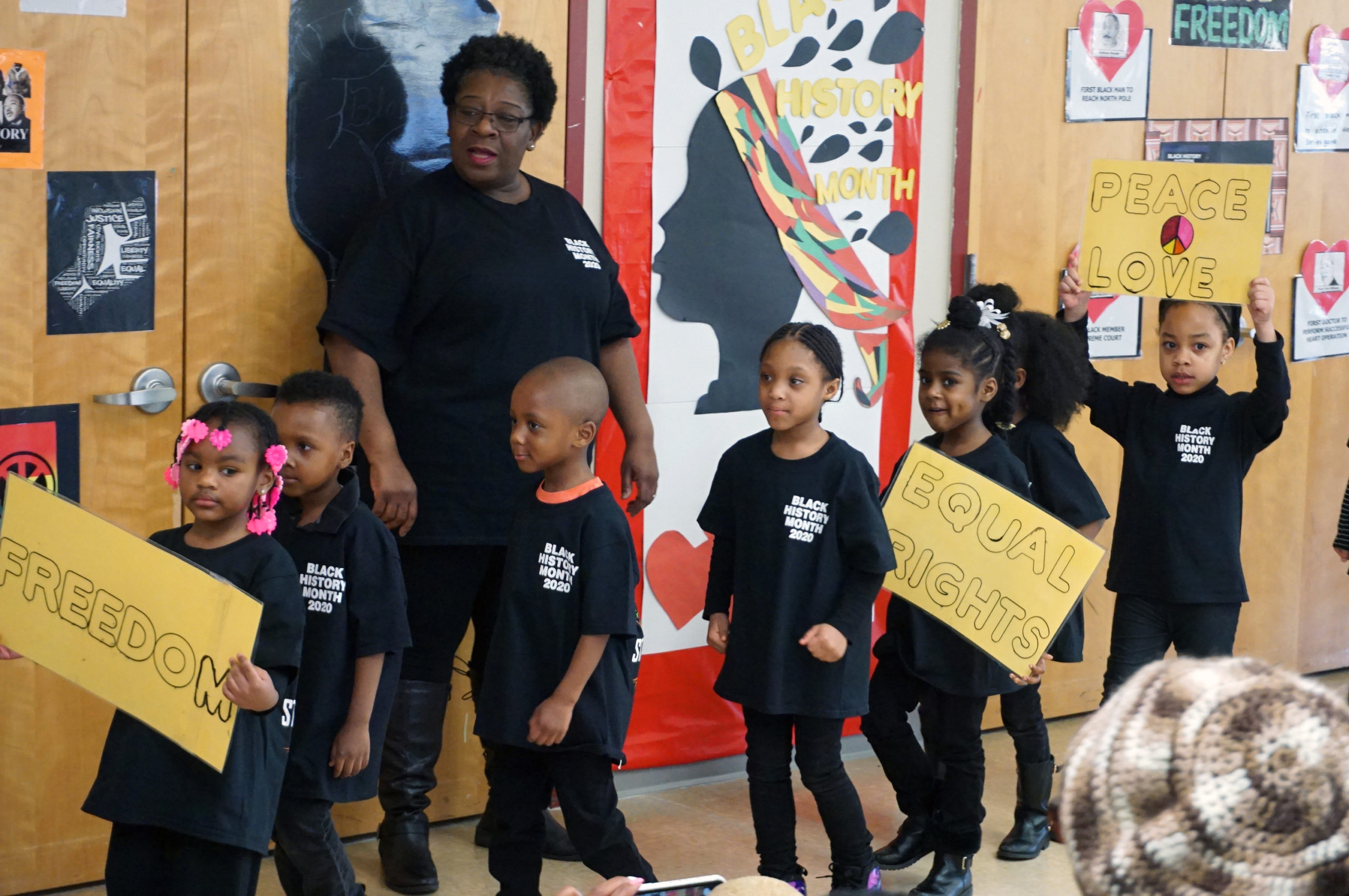 CHELC Black History Month Celebration Class with Shirts and Signs