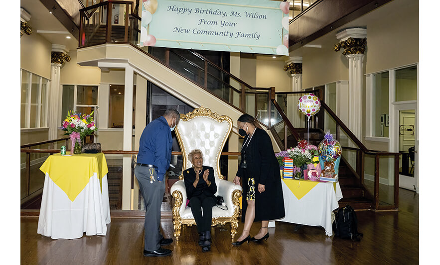 Madge Wilson 89th Birthday 4-12-2022 Fred Hunter Madge Wilson Denise Anderson with banner for web